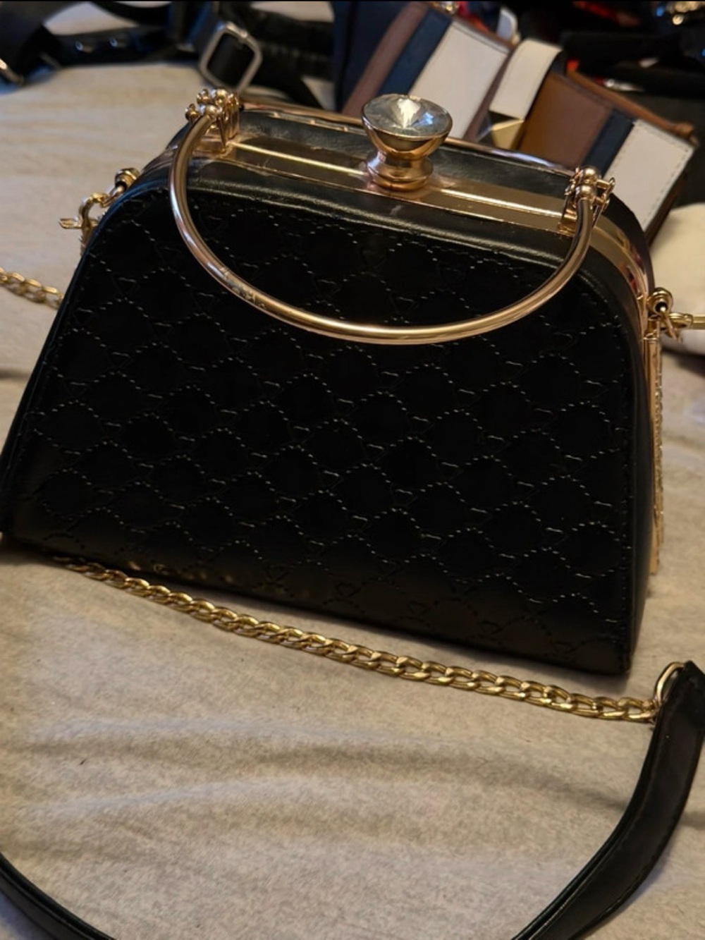 Black Quilted Dome Crossbody Bag with Gold Hardware
